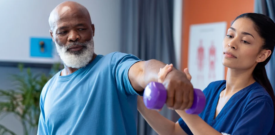 Physiotherapist Helping Patient Mobility Exercise
